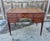 Elegant and timeless English mahogany kneehole writing desk dating to the late Victorian / early Edwardian period (circa...