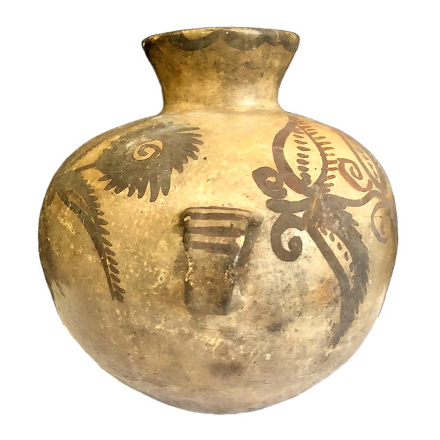 On offer is an authentic historic Native American Pueblo water jar, or “olla,” with dual-loop handles and bold polychrome...