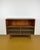 Vintage 1950s Danish teak low bookcase with sliding pleated glass doors, an elegant design perfect for mid-century decor....