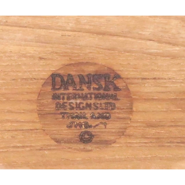 Set of three teak serving bowls, designed by Jens Quistgaard for Dansk, circa 1970's. The set includes the large master...