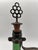 Mid-Century Modern Antique 18th Century Green Glass Bocksbeutel Bottle with Dark Metal Mount and Ring-Shaped Stopper For Sale - Image 3 of 5