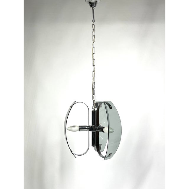 Rare Italian Chrome and Light Blue Glass Ceiling Chandelier, Mid-Century Modern, 1970s This rare Italian ceiling...