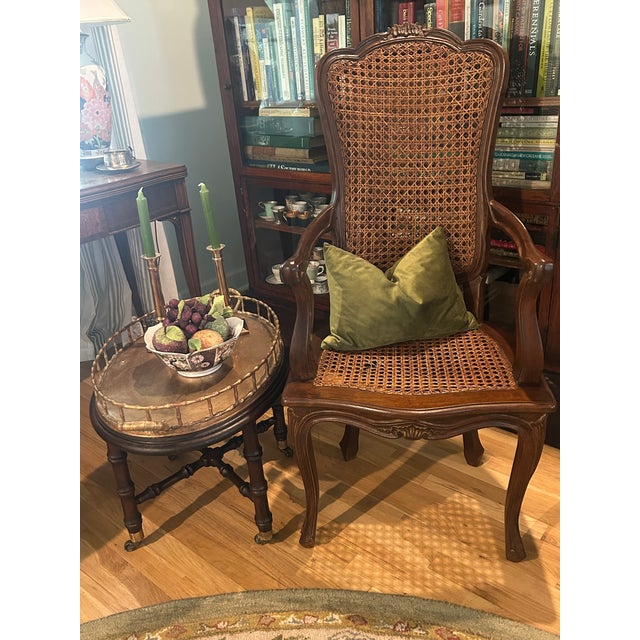 This is an early 20th-century Italian Louis XV Revival armchair, crafted in walnut with a beautifully shaped and hand-...