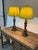 Design Plus Gallery presents a Pair of Turned Dark Bronze Table Lamps in a Traditional Mid Century Style. They have a...