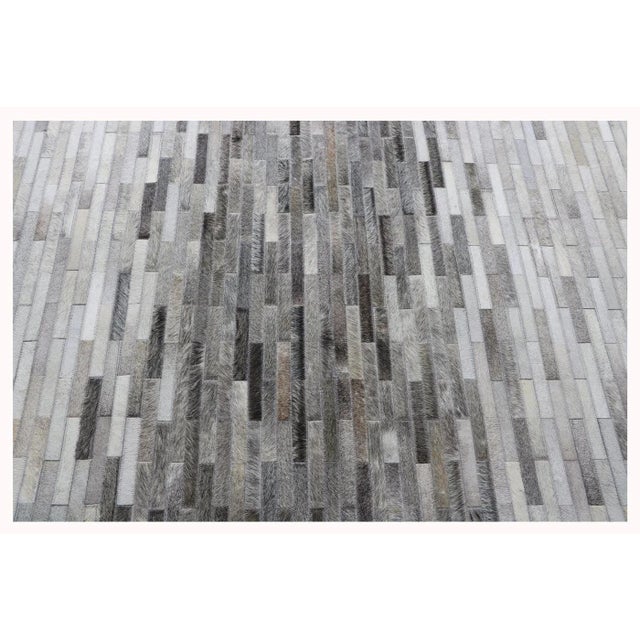 The Galaxy Collection provides a fresh take on classic geometric design. Hand-stitched by skilled artisans. These rugs are...