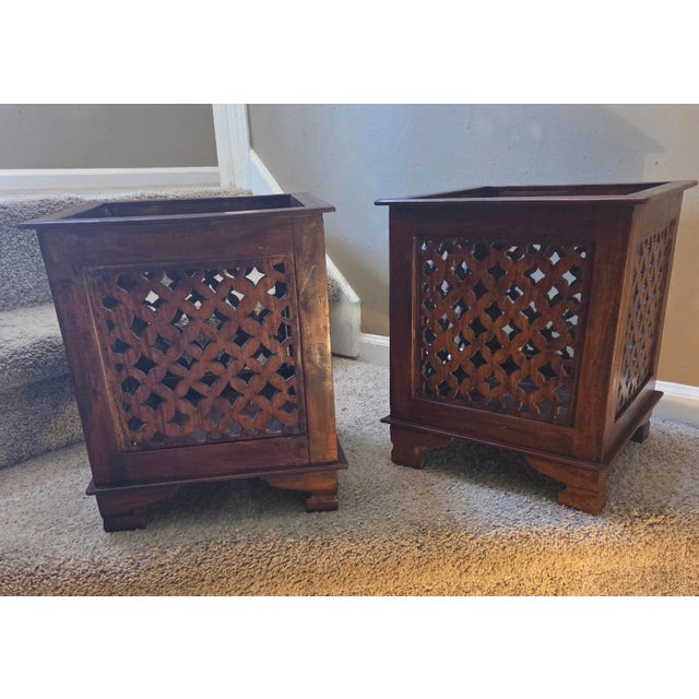 Add stunning architectural texture to your home with this gorgeous matching pair of vintage teak planters featuring an...