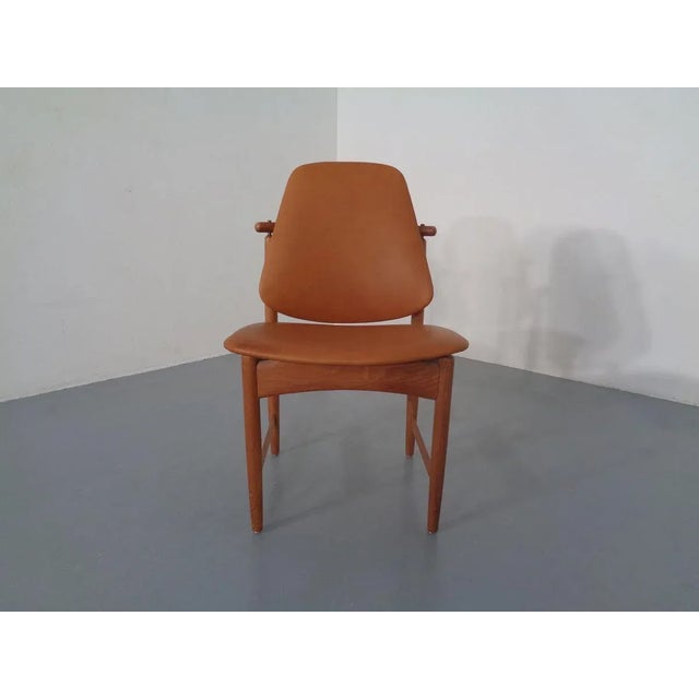 Arne Olsen Hovmand-chair from the 1950s. Covered with champagne-colored leather. I have official proof of authenticity...