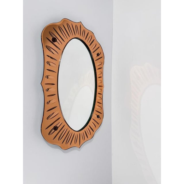 We are pleased to offer for sale a truly magical mid-20th century Italian modern mirror, dating to the 1950s. This rare...