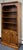 Farmhouse style pine bookcase by Ethan Allen from their Country Craftsman collection. Upper section features one fixed top...
