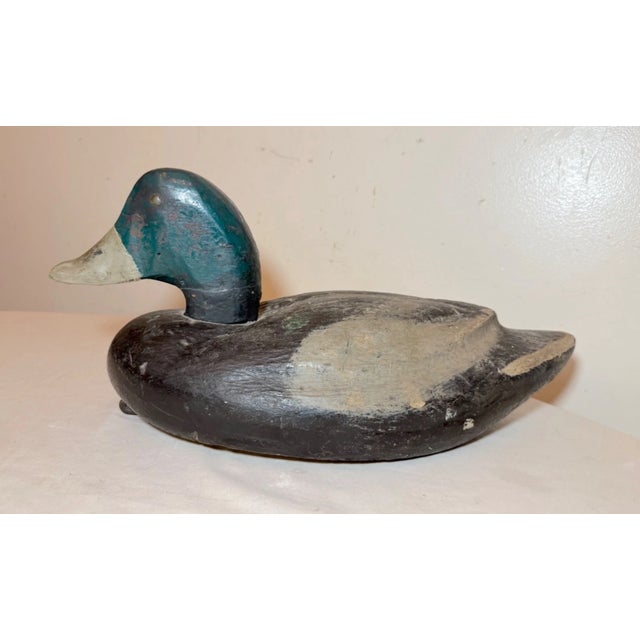 Up for sale is a wonderful antique hand carved wooden mallard decoy. It is beautifully carved with nice detailing, painted...