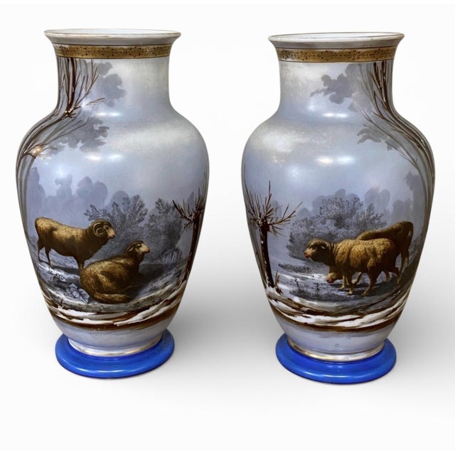 A striking pair of 19th-century French vases, hand-painted in the Limoges-quality style, featuring beautifully detailed...