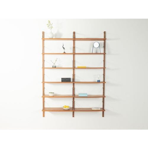 1950s Wall Shelf, Poul Cadovius Perfect design: perfect proportions and unmistakable attention to detail.High-quality...
