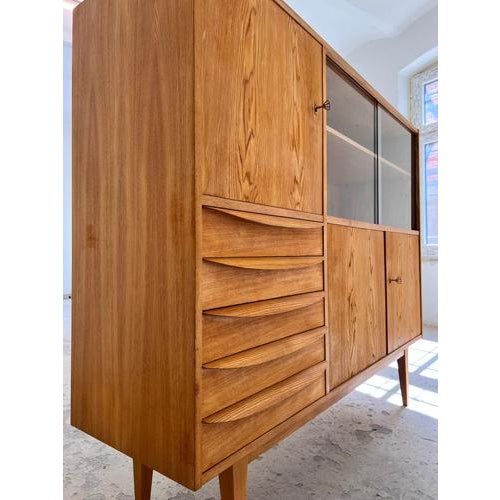 This living room cabinet from the 602 series is far more than just a piece of furniture – it's a significant fragment of...