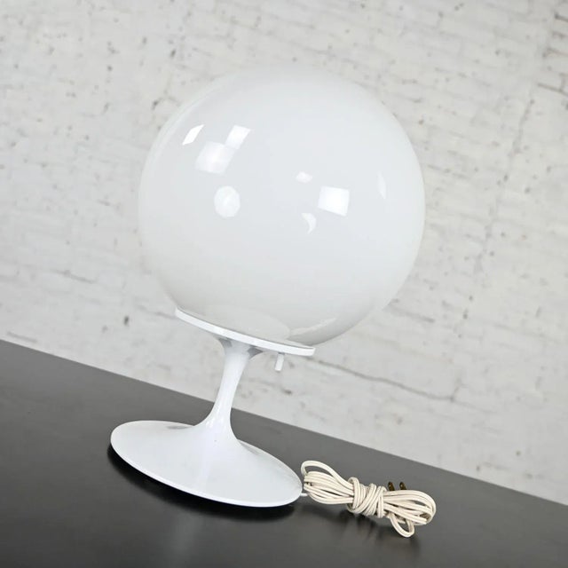 Gorgeous Stemlite opaque white glass ball shade table lamp by Bill Curry for Design Line. Beautiful condition, keeping in...