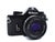 This Nikon EM 35mm SLR is a masterclass in minimalist industrial design, featuring a sleek, ultra-compact body penned by...