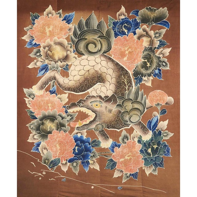 A large piece of framed Japanese textile circa late 19th to early 20th century, end of Meiji period. Seamed together from...