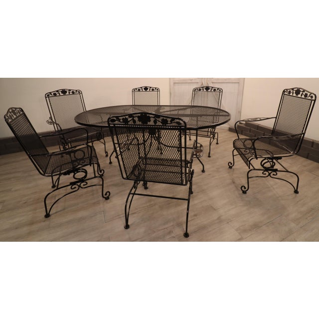 An elegant example of Meadowcraft’s Dogwood collection, this wrought iron dining set brings the romance of a garden...