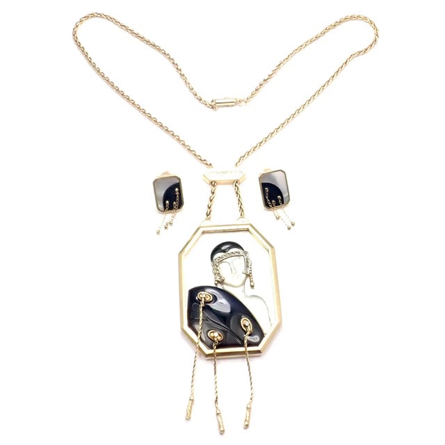 14k yellow gold, diamond, mother of pearl, black onyx, necklace and earrings set from Erte titled "Folies." ***This...