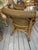 The product is a set of two fully assembled 1980s custom wicker porch chairs, designed in a brown color and suitable for...
