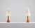 Pair of teak table lamps produced in Sweden during the 1960s. Up to 250V (Europe/UK Standard).The wiring of this item may...