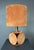 A substantial 1970s table lamp with a sculptural base constructed from suede-wrapped circular discs arranged around a...