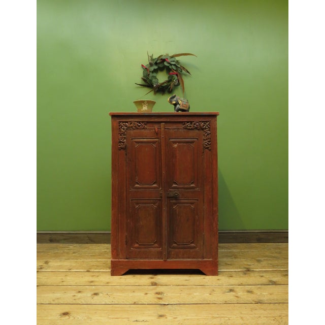 A handsome antique Indian cupboard dating to the 19th century. The cupboard is fairly compact and heavy and is very well...
