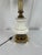 Vintage Stiffel table lamp, with brass bases and columns, and octagonal urn-form white porcelain bodies. Gilt trim to...
