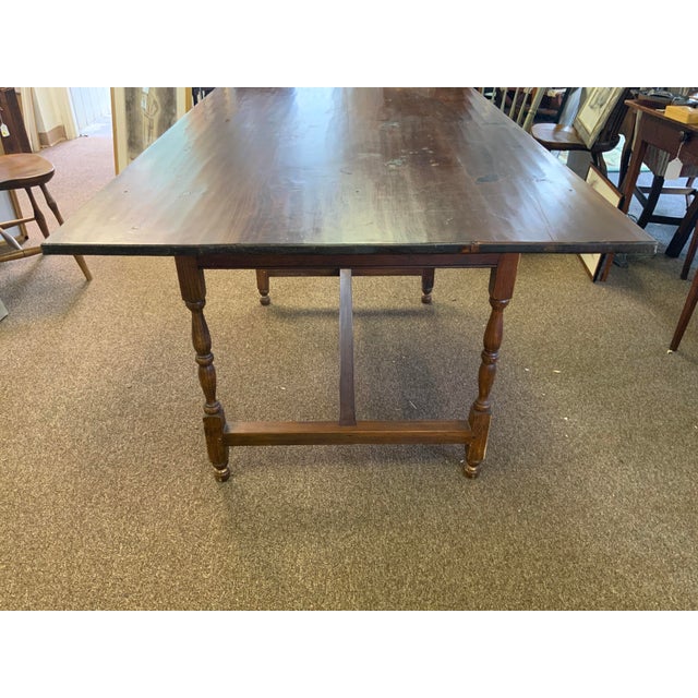 Late 20th century hand crafted , hand planed top ripple effect, wood tavern table. Reproduction of early American design....