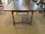Late 20th century hand crafted , hand planed top ripple effect, wood tavern table. Reproduction of early American design....
