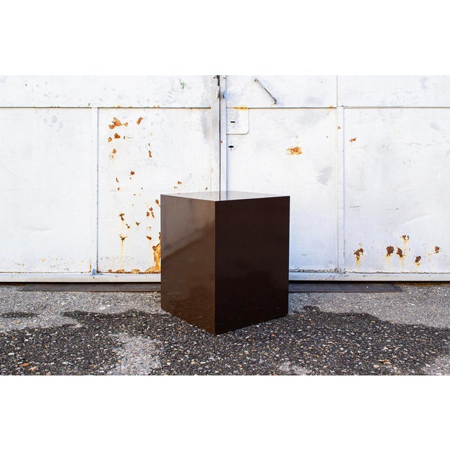 Freestanding modular bookcase with a wooden frame and lacquered wood covering. Abstracta model Designer: Poul Cadovius...