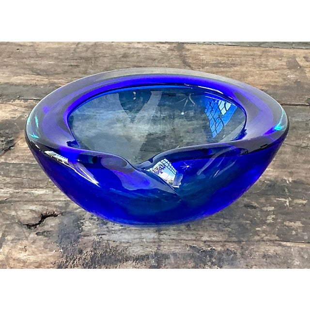This exquisite vintage Italian art glass bowl is a vibrant example of mid-century biomorphic design, heavily influenced by...