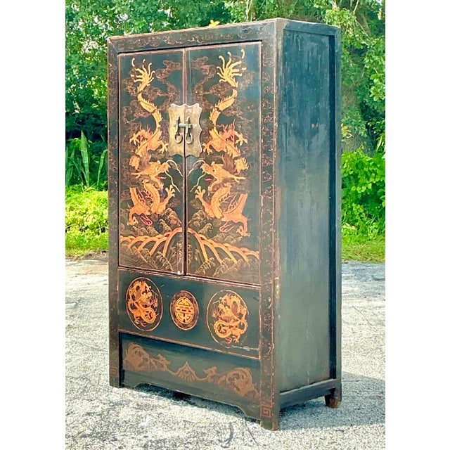 Elevate your space with this striking Vintage Asian Hand-Painted Dragon Cabinet. Featuring a bold, intricately painted...