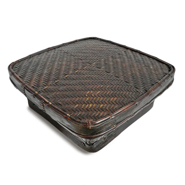 Vintage Akha hill tribe basket from Northern Thailand. Beautiful handwoven bamboo storage vessel featuring a softly...