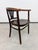 An exceptional and highly collectible Art Nouveau bentwood armchair, model No. 24 designed by the prominent German...