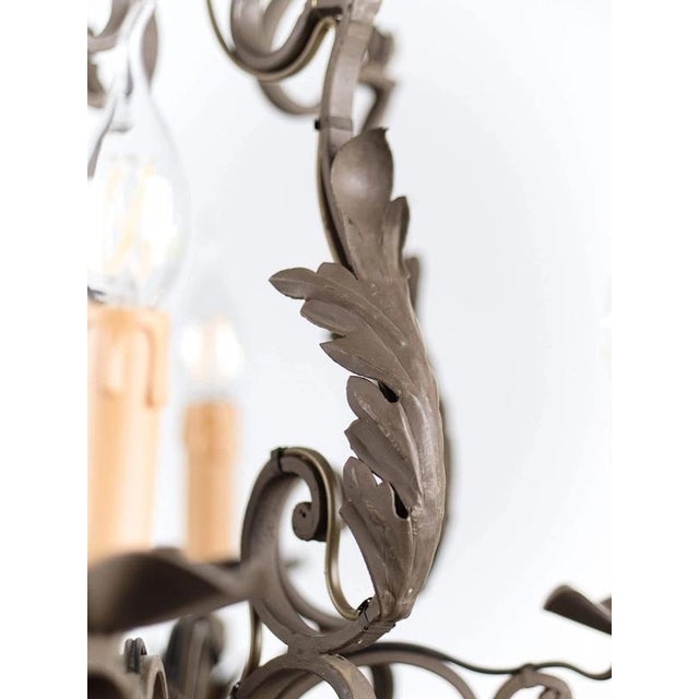 Four-arm metal chandelier from the beginning of the last century. New power cable, electrical installation, sockets and...