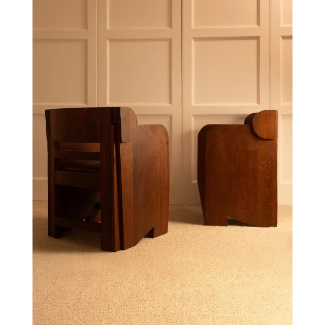 Pair of sculptural oak armchairs, early 20th century, Netherlands, with anthroposophical design reminiscent of the...