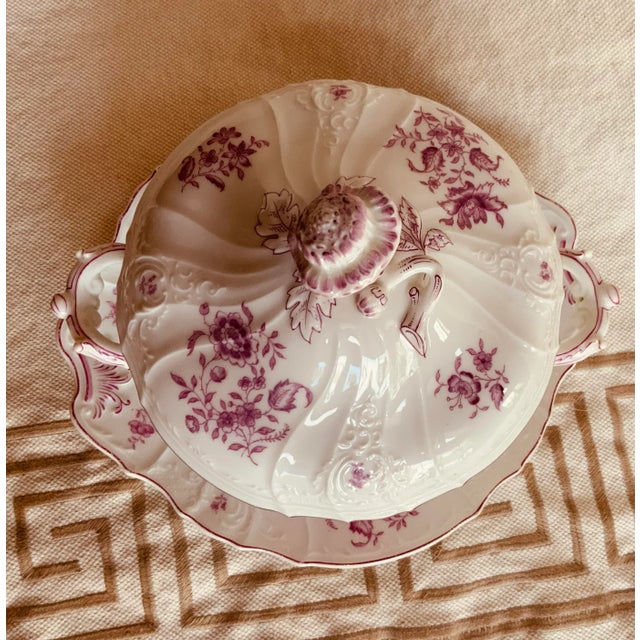 An early 19th-century French porcelain sauce tureen set — tureen with fitted lid and coordinating underplate — acquired...