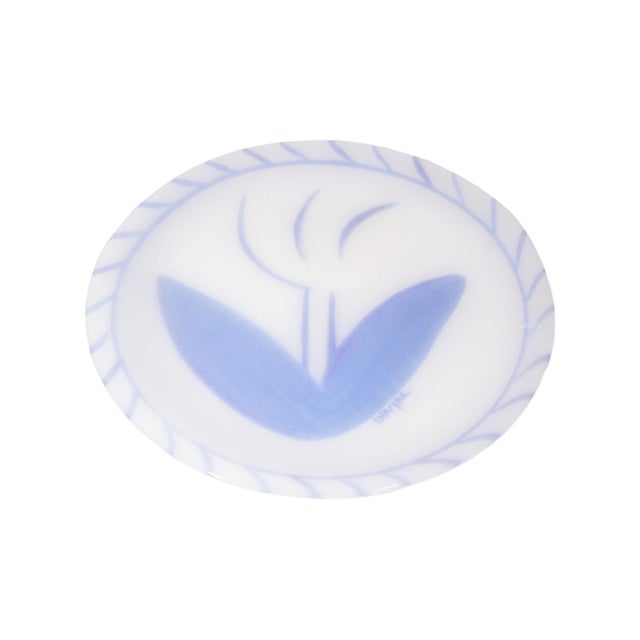 A glass plate designed by Swedish artist Ulrica Hydman (1938-2018) for Swedish glass company Kosta Boda. This plate has a...