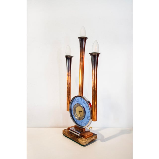 Clock lamp with copper and chromed metal frame, glass details, and a marble base. Art Deco style 1930s Up to 250V...