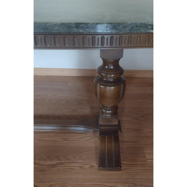 A stunning and substantial vintage Scandinavian coffee or cocktail table, dating to approximately 1940. This elegant piece...