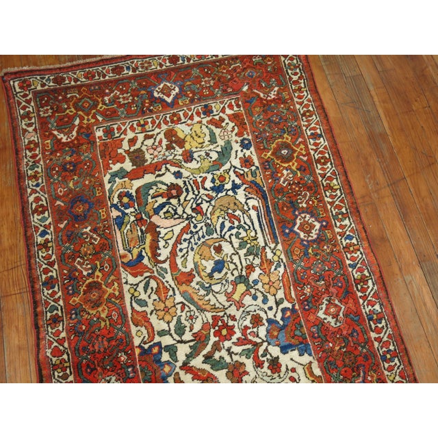 a late 19th-century Northwest Persian ivory-ground antique runner Details rug no. j1184 size 2'11" x 15'1''