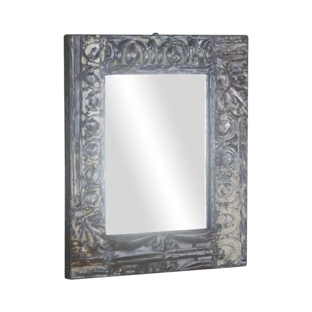 This mirror is hand crafted using antique tin ceiling tiles. This item is unique. Contact us about other style and colors...