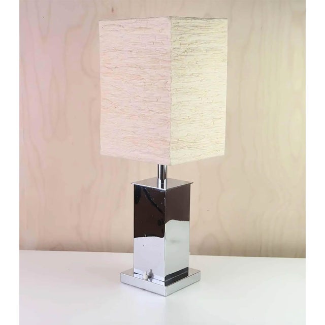 Mid-Century Modern English Chrome Table Lamp, 1970s, in Good conditions. Designed 1970 to 1979 UK Plug (up to 250V).The...