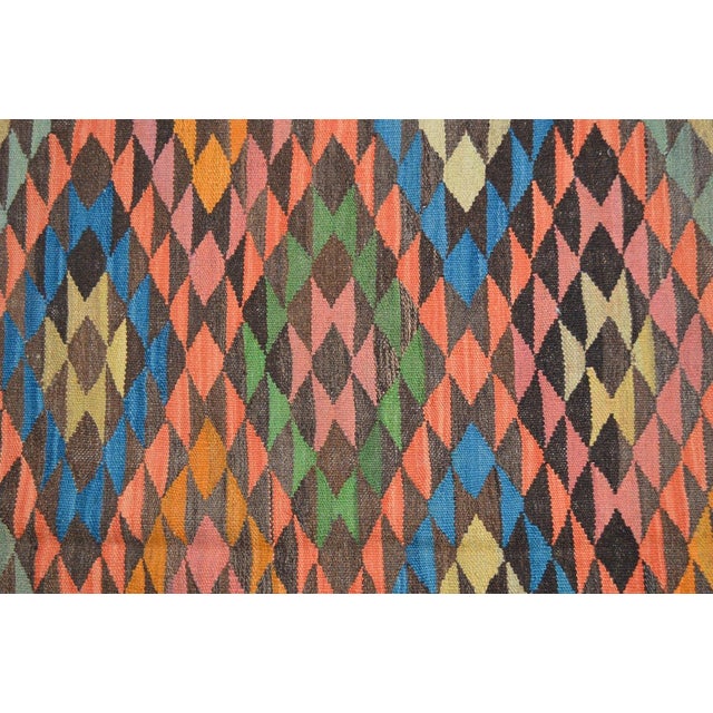 Flatweaved with care using traditional rug-making techniques, this wool rug blends timeless craftsmanship with a modern...