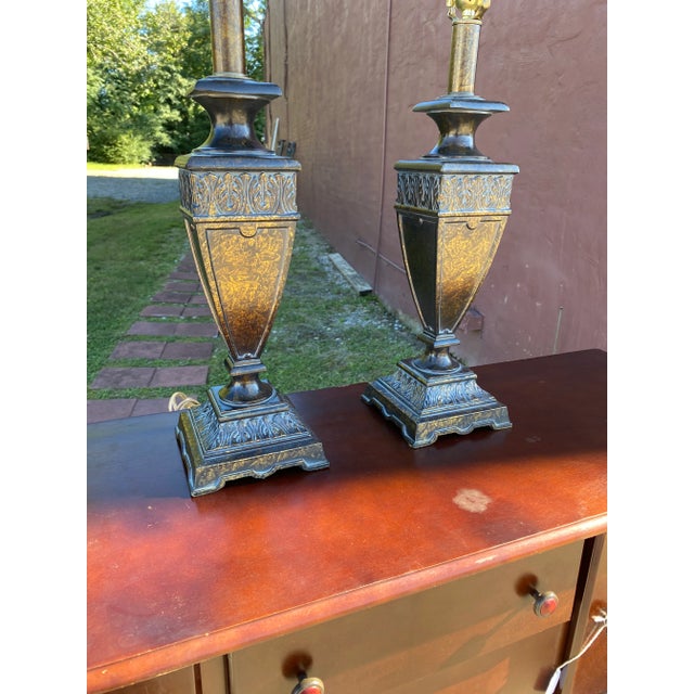 Good Solid Pair of Heavy Constructed Metal Lamps made by Berman. These Lamps have a Bronze Look to them and a great...