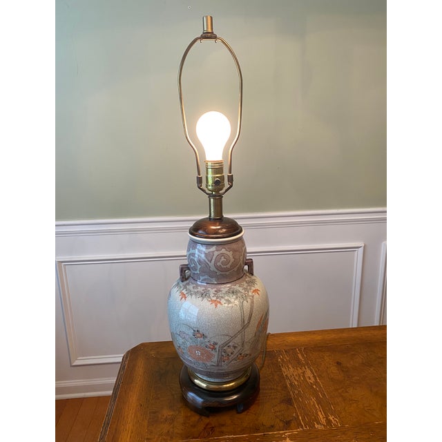 Gorgeous Chinoiserie Lamp with a floral scene with birds. This lamp also has a beautiful shape and very colorful, however...