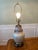 Gorgeous Chinoiserie Lamp with a floral scene with birds. This lamp also has a beautiful shape and very colorful, however...