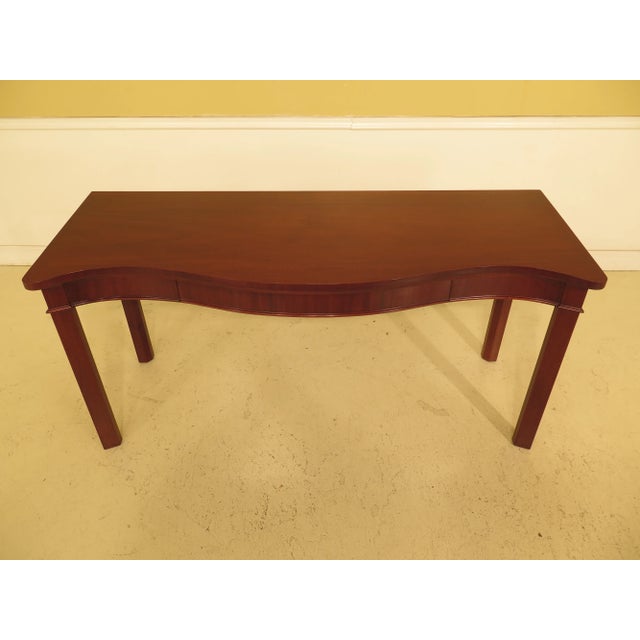 Saybolt Celand Chippendale mahogany 1 drawer console table. Features dovetailed drawer construction. Professionally...