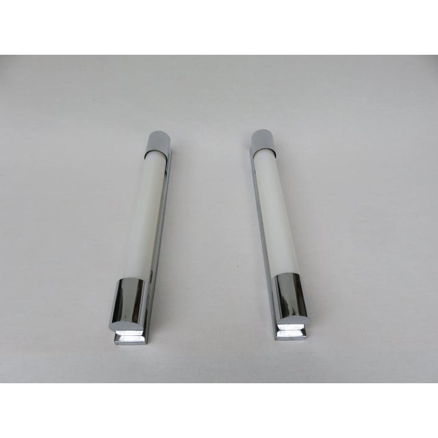 - Pair of Art Deco wall lights in a simple design - Feature festoon bulbs held by chrome plated frames - Can be installed...