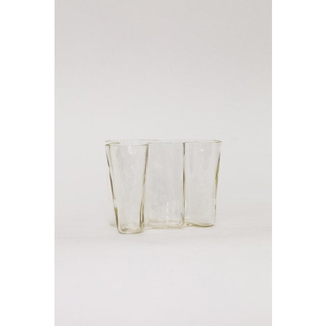 The Savoy vase with a subtle yellow tone is a very rare version from the early 1950s, manufactured by Karhula / Karhula-...